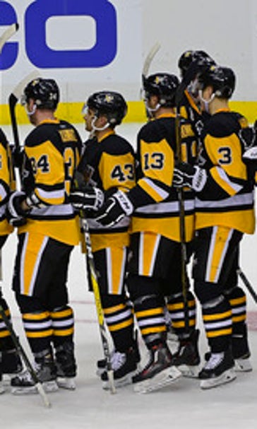 Penguins begin title defense with 3-2 win over Capitals
